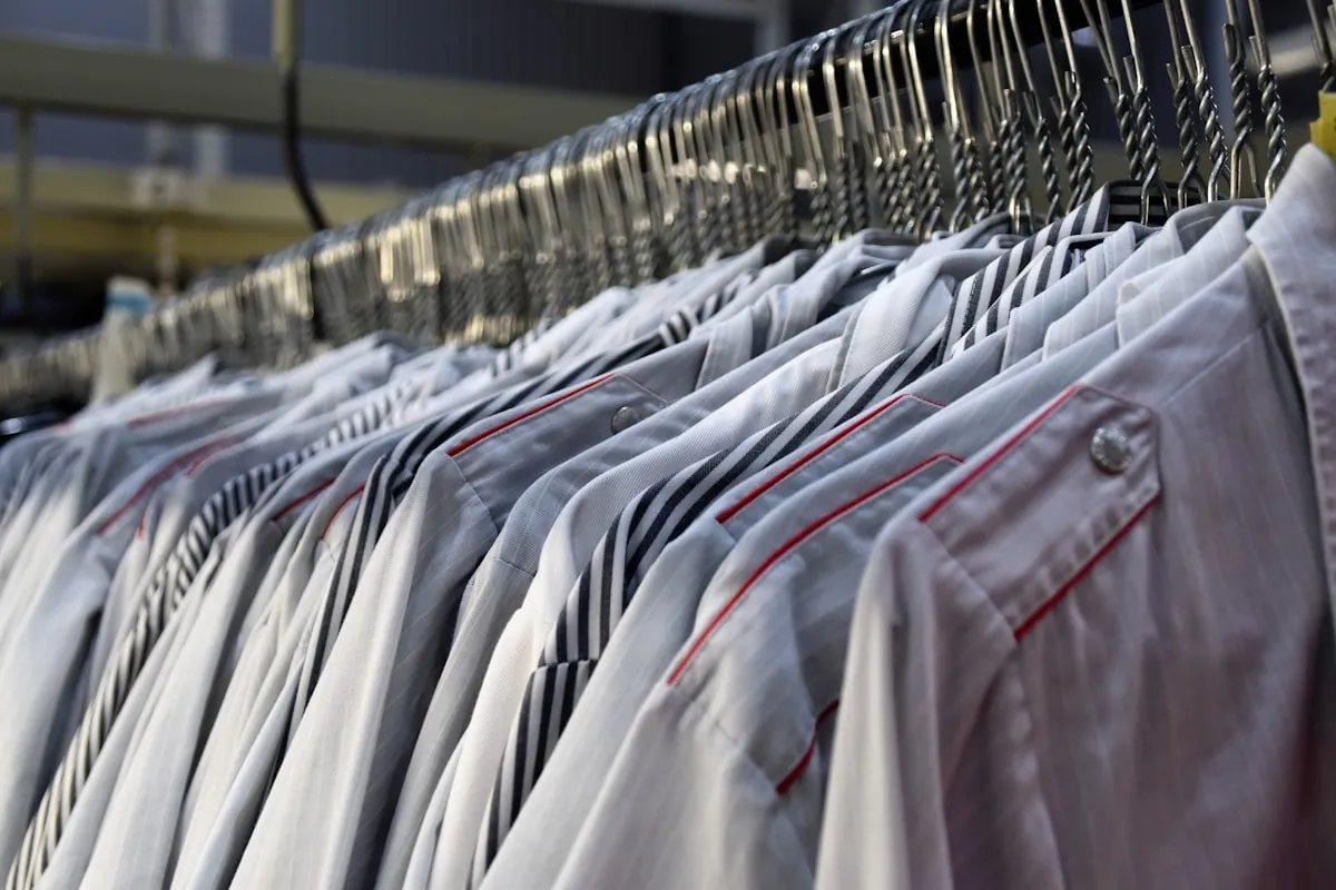 Pressed shirts neatly arranged on hangers